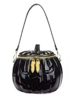 Black pumpkin-shaped handbag with gold accents on a white background